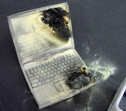 melted broken burned ruined laptop computer