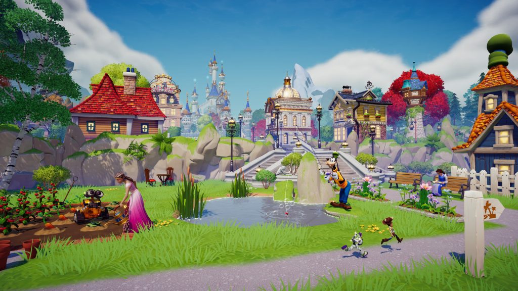 A 3D render of a village from Disney: Dreamlight Valley. A selection of cute European-style houses sit in a grassy field under a blue sky. The landscape is slightly scruffy, but pretty. To the left, Wall-E and Rapunzel work on a farm. In the middle of the image, Goofy is fishing while Buzz and Woody run past him. In the background, Belle is reading a book.