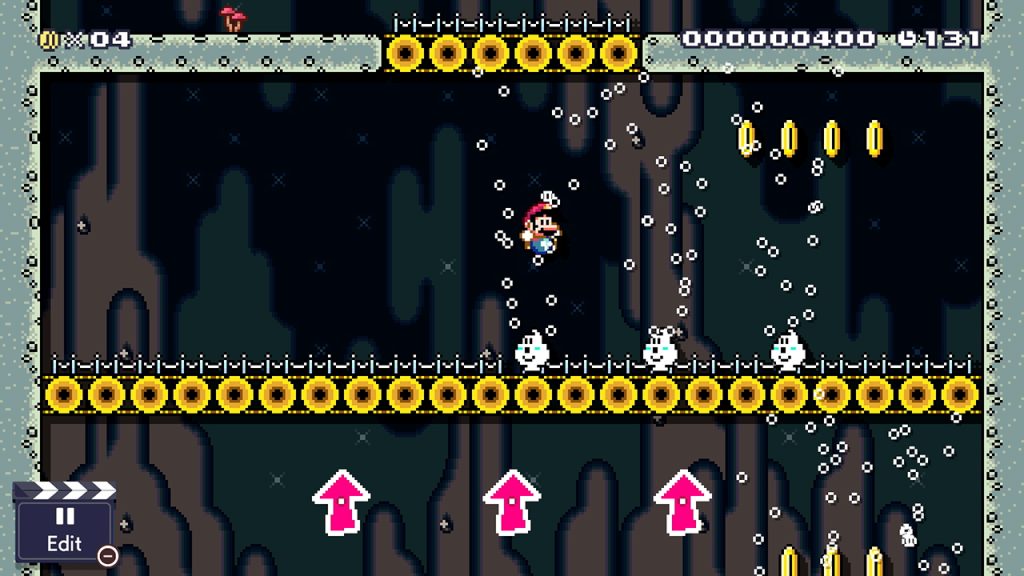An image of a Mario Maker level in the Super Mario World style. Mario is in an Underground style level. He's floating on a wind- shown by a series of white bubbles- between round, yellow platforms. 