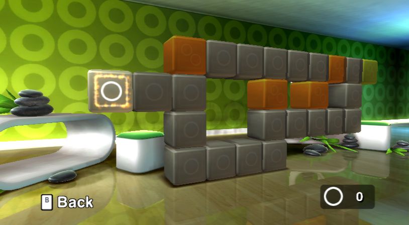 A realistic render of a level from Art of Balance. The level is set in a Y2Kcore room, with walls covered in green circles and white plastic furniture behind the puzzle. Stacked rocks sit on a white table and on the polished wooden floor. The puzzle this time is made up of large stone blocks, some grey and some orange, with circles similar to the wallpaper on their sides.
