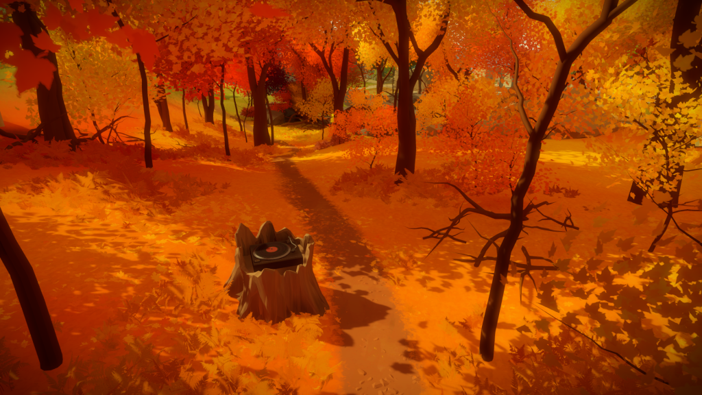 A screenshot from The Witness: an orange forest, with orange grass and orange trees. A record player sits atop a tree stump next to a path. 